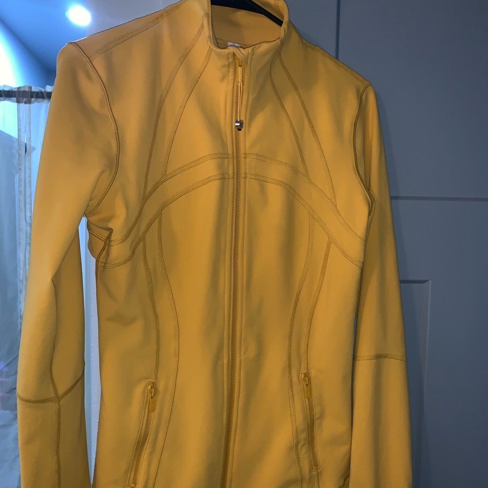 Lulu Lemon zip up coat. Size 10 Mustard Yellow